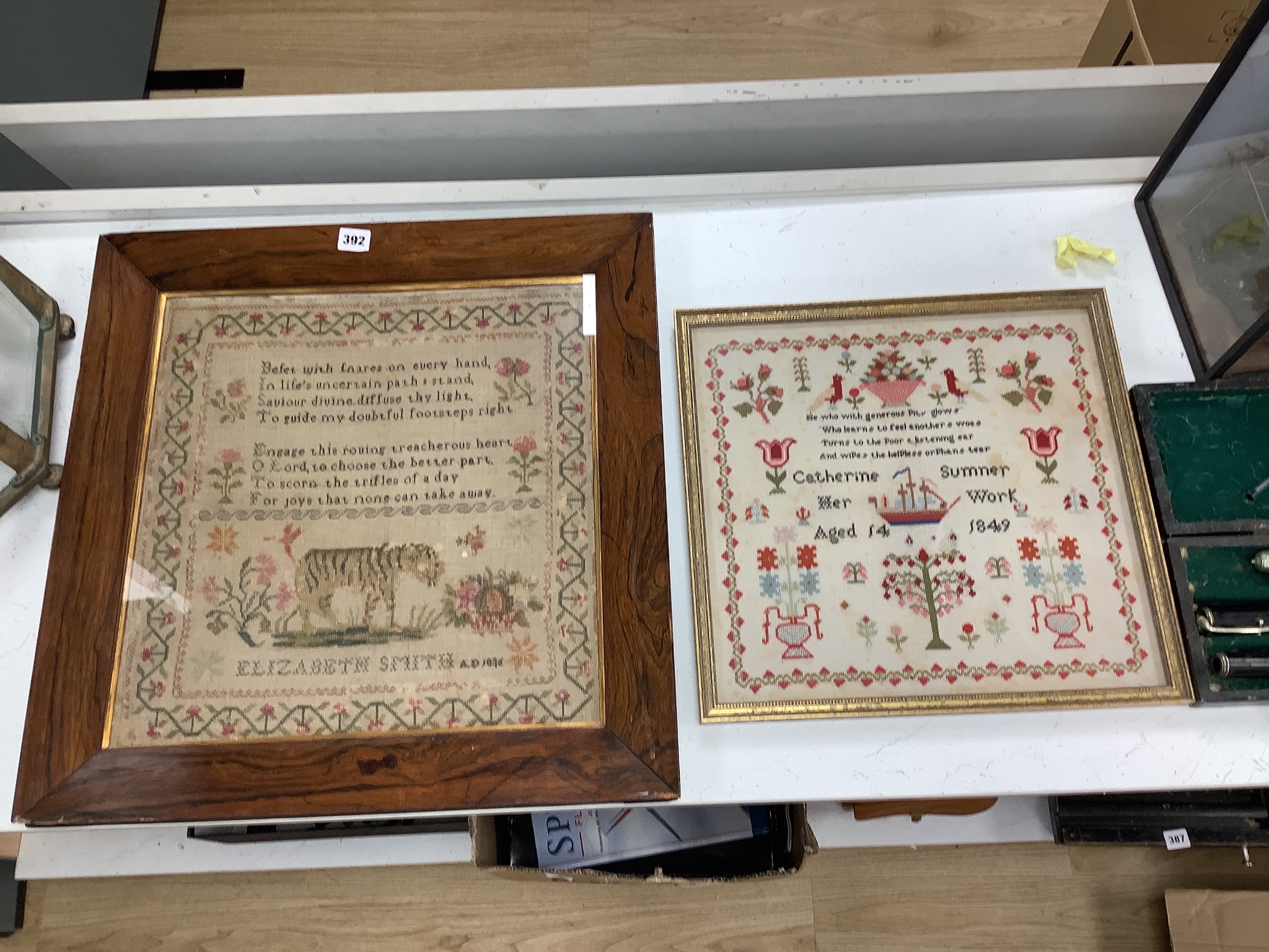 A William IV needlework sampler, worked with text and a lion, by Elizabeth Smith, dated 1836 and a Victorian needlework sampler, by Catherine Summer, dated 1849